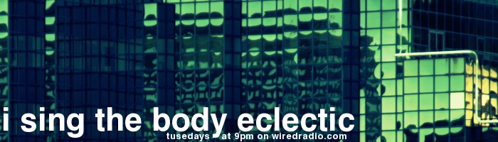 The show's banner. A photo of some office windows reflecting a teal sunset, with sans-serif text that reads "I Sing the Body Eclectic: Tuesdays at 9pm on wiredradio.com"